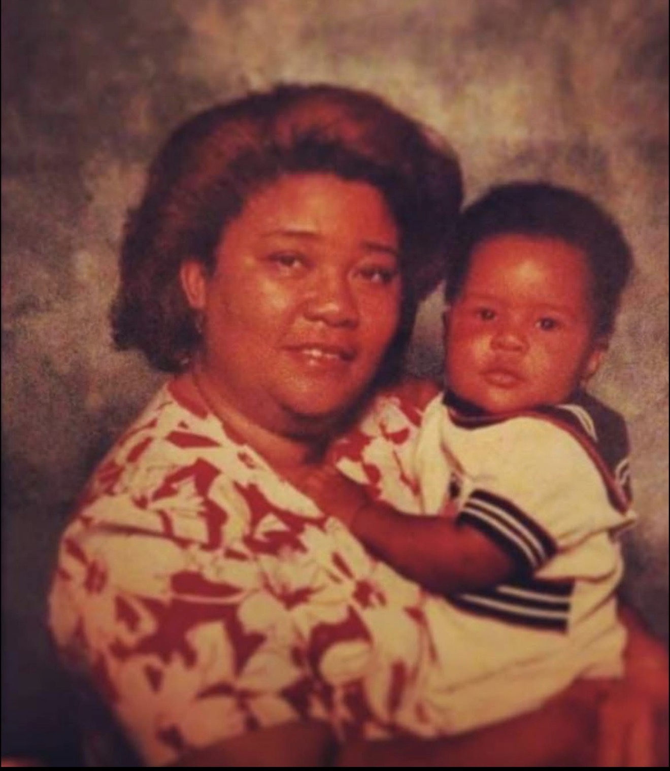 Vintage portrait of Knighton mother holding her baby