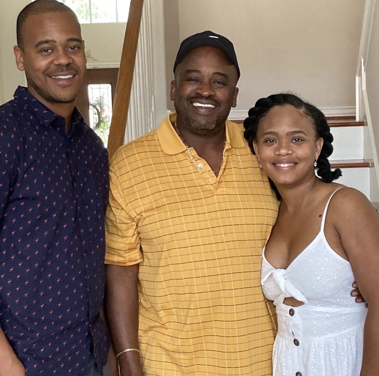 Knighton father with his son and daughter on the staircase