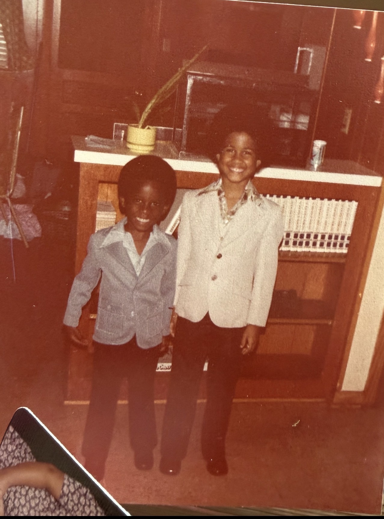 Two young Knighton brothers in suits